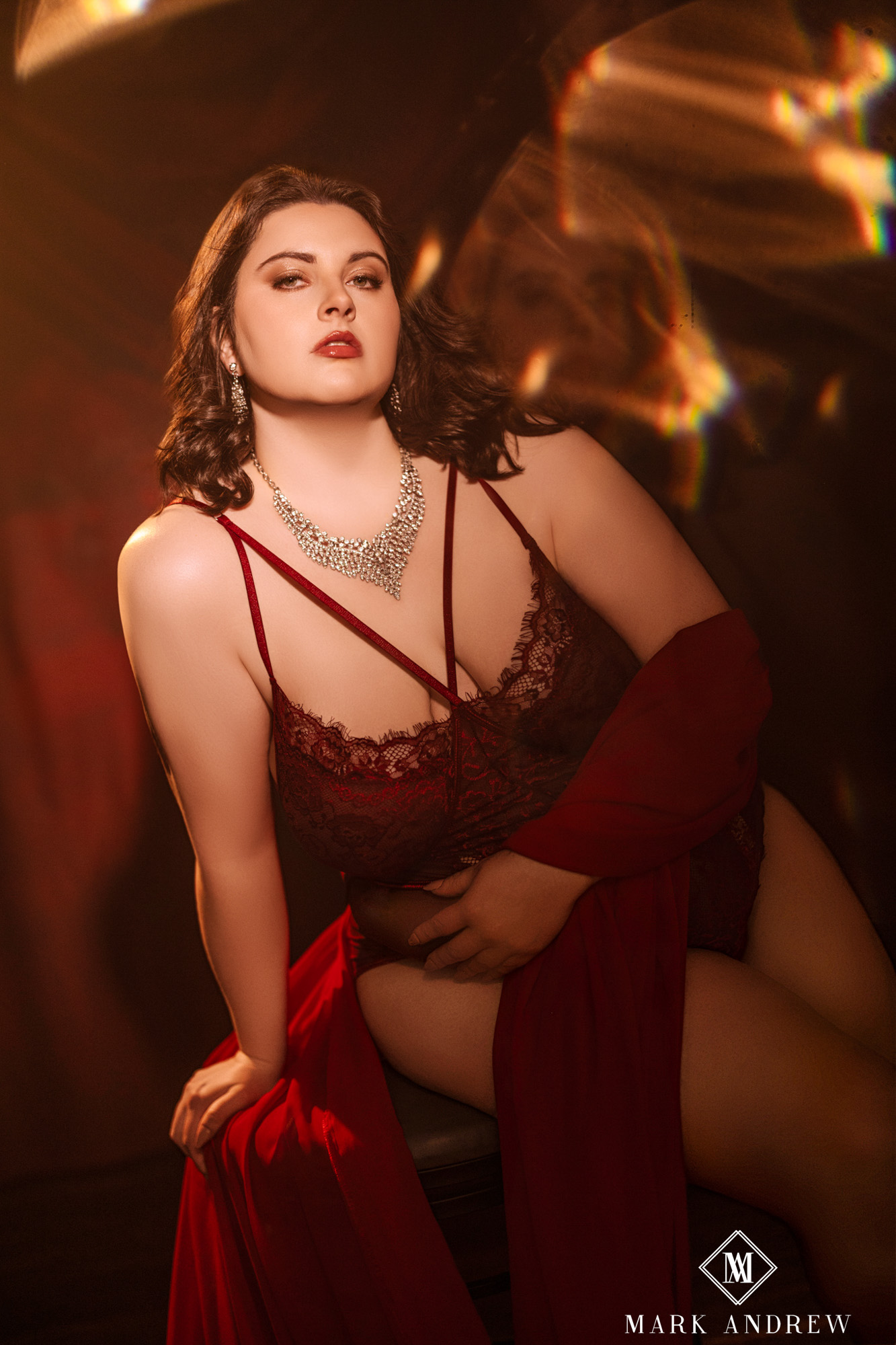 Katherine in Set 2 — red curtains theatrical boudoir portrait